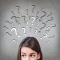 Woman has too many questions Royalty Free Stock Photo