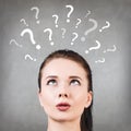 Woman has too many questions Royalty Free Stock Photo