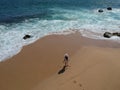 Woman in hat at sand tropical above beach Acapulco, Mexico Royalty Free Stock Photo