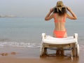 Woman with hat on beach