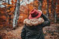 Woman with hat exploring the autumn forest Royalty Free Stock Photo