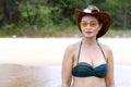 Woman and hat portriat outdoor on beach