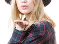 Woman in hat sending air kiss Royalty Free Stock Photo