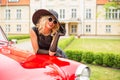 Woman with hat and sunglases with retro car Royalty Free Stock Photo