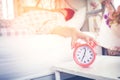 woman hates waking up early in the morning. Sleepy girl Touch at Royalty Free Stock Photo