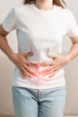 woman having abdomen ache due to Stomach pain, digestion with constipation or Diarrhea from food poisoning, female problem and Royalty Free Stock Photo