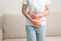 woman having abdomen ache due to Stomach pain, digestion with constipation or Diarrhea from food poisoning, female problem and Royalty Free Stock Photo