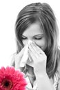 Woman having allergy from spring flowers