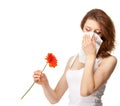 Woman having allergy from spring flowers Royalty Free Stock Photo
