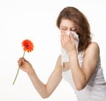 Woman having allergy from spring flowers Royalty Free Stock Photo