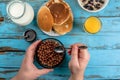 Woman having breakfast with cereal chocolate balls Royalty Free Stock Photo