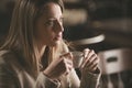 Woman having a coffee at the bar Royalty Free Stock Photo