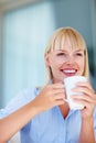 Woman having coffee break. Portrait of beautiful young business woman having coffee during break. Royalty Free Stock Photo