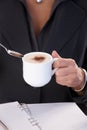 Woman having coffee with milk