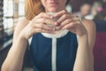 Woman having coffee by the window in a diner Royalty Free Stock Photo