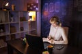 Woman having conference call taking notes in planner Royalty Free Stock Photo