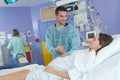woman having contraction giving birth in hospital with husband Royalty Free Stock Photo