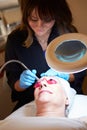 Woman Having Dermo Abrasion Cosmetic Treatment At Spa