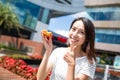 Woman having egg tart in Hong Kong Royalty Free Stock Photo