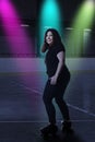 Woman having fun at roller skating rink Royalty Free Stock Photo