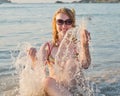 Woman having a fun while swimming in the sea
