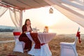 Woman having a glass of wine on romantic dinner Royalty Free Stock Photo