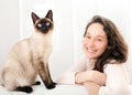 Woman having good times at home with cat Royalty Free Stock Photo