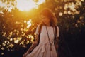 A woman having goodtime in sunset light