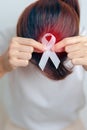 Woman having Headache with grey ribbon. Brain Cancer Awareness May month, World Brain Tumor day, Brain Stroke, Dementia, alzheimer Royalty Free Stock Photo