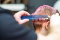 Woman having her hair cut. Royalty Free Stock Photo