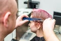 Woman having her hair cut Royalty Free Stock Photo