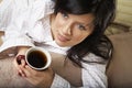 Woman is having her morning tea Royalty Free Stock Photo