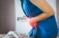 Woman having painful stomachache,Female suffering from abdominal pain,Period cramps Royalty Free Stock Photo