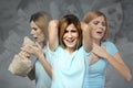 Woman having panic attack on grey background