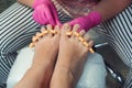 Pedicure and foot care treatment. Female relaxing at salon, caring about nails. Professional pedicure in the beauty salon. Feet Royalty Free Stock Photo