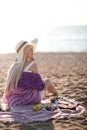 Woman having picnic at beach Royalty Free Stock Photo