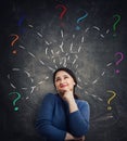 Woman having questions Royalty Free Stock Photo