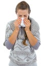 Woman having running nose and using napkin