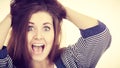 Woman having shocked amazed face expression Royalty Free Stock Photo