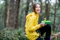 Woman having a snack in the forest Royalty Free Stock Photo