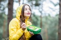 Woman having a snack in the forest Royalty Free Stock Photo