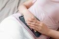 Woman is Having Stomach Ache or Menstrual Period, Close-Up Portrait of Young Woman is Suffering From Abdominal Pain at Her Home.