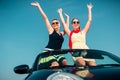 Woman having summer trip in convertible car Royalty Free Stock Photo