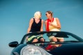 Woman having summer trip in convertible car Royalty Free Stock Photo