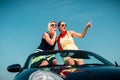 Woman having summer trip in convertible car Royalty Free Stock Photo