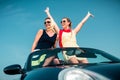 Woman having summer trip in convertible car Royalty Free Stock Photo