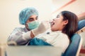 Woman having teeth examined at dentists Royalty Free Stock Photo