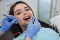 Woman having teeth examined at dentists Royalty Free Stock Photo