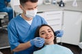 Woman having teeth examined at dentists Royalty Free Stock Photo