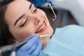 Woman having teeth examined at dentists Royalty Free Stock Photo